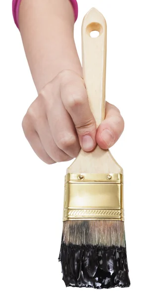 Front view of painter hand with black paintbrush — Stock Photo, Image