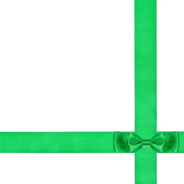 Double green bow knot on two crossing silk ribbons — Stock Photo, Image