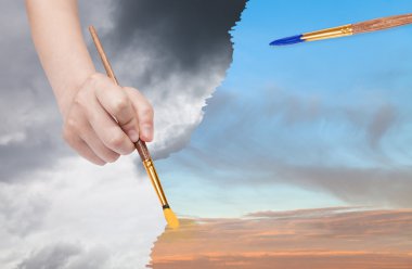 paintbrush paints sunset sky instead of rainy clouds