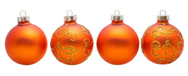 Quatre boules de Noël orange isolées sur blanc — Photo