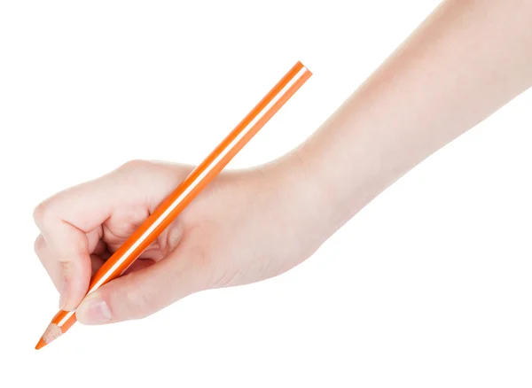 Hand draws by wooden orange pencil isolated — Stock Photo, Image