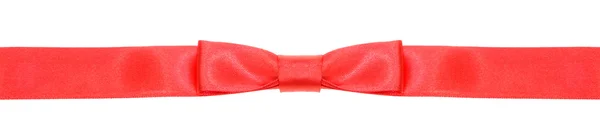 Nudo de lazo rojo simétrico en cinta de seda estrecha — Foto de Stock