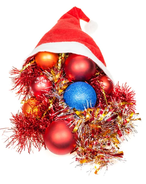 Vánoční dekorace v červeném klobouku santa — Stock fotografie