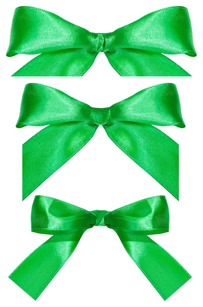 三个绿色的缎子弓结上白色孤立 — 图库照片