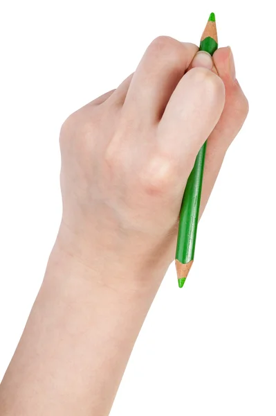 Vista sopra di mano disegna a matita verde — Foto Stock