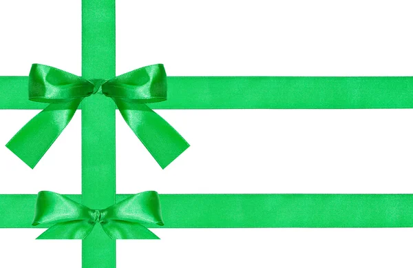 Two big green bow knots on three satin ribbons — Stock Photo, Image