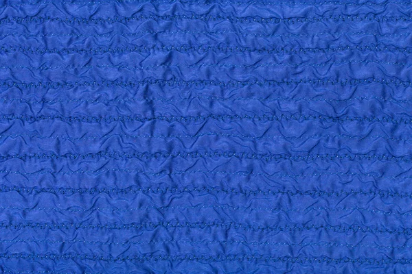 Stitched wrinkled blue silk fabric — Stock Photo, Image