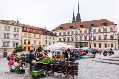 People buy vegetables at Cabbage Market in Brno