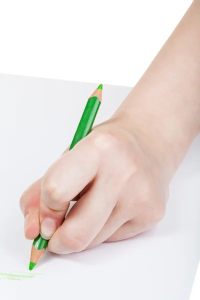 绿色的铅笔在纸上的手草稿 — 图库照片