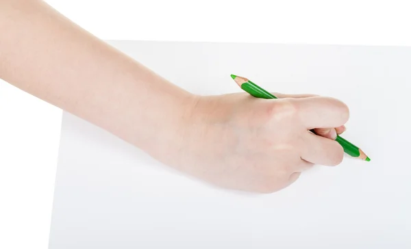 Hand writes by green pencil on sheet of paper — Stock Photo, Image