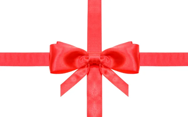 Red bow with vertically cut ends on intersection — Stock Photo, Image