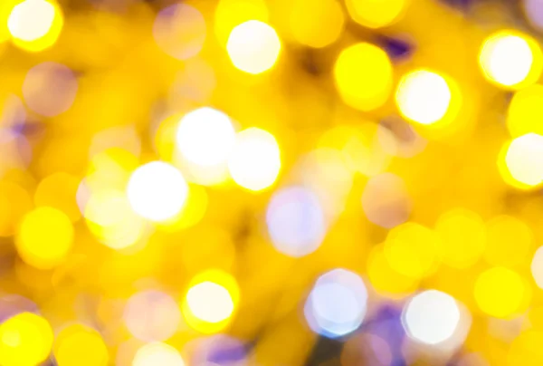 Желтый и фиолетовый мерцающие рождественские огни — стоковое фото
