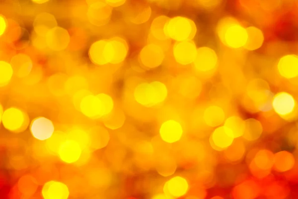Geel en rood wazig flikkerende Kerstverlichting — Stockfoto