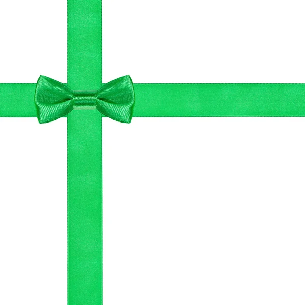 One green bow knot on two crossing satin ribbons — Stock Photo, Image