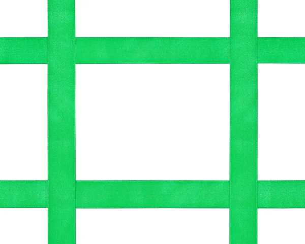 Cuatro cintas de satén verde de cruce aisladas —  Fotos de Stock