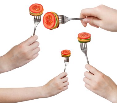 set of forks with impaled fresh sliced vegetables clipart