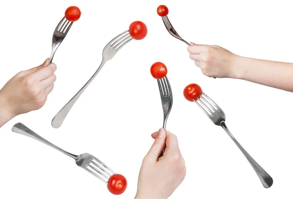 Set of forks with one fresh red cherry tomato — Stock Photo, Image