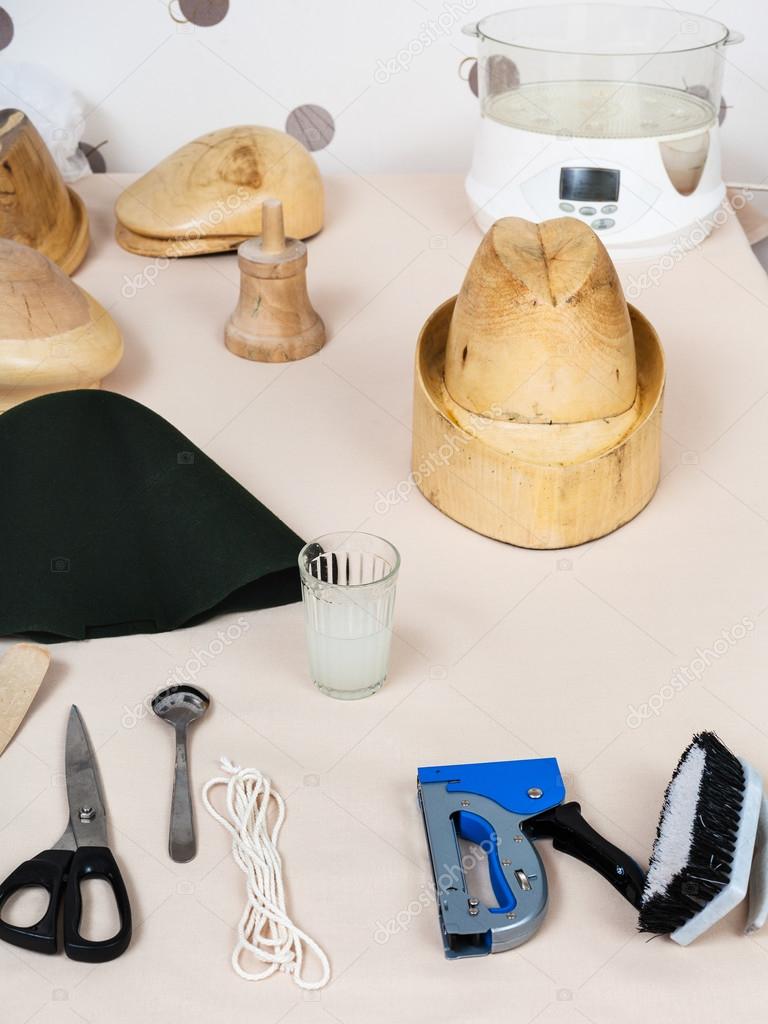 tools and equipment for hatmaking on table