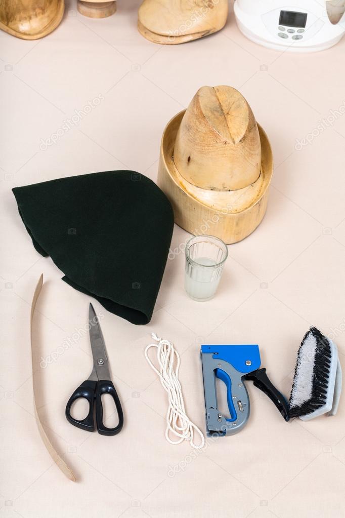 felt hood, wooden hat-block, tools for hatmaking