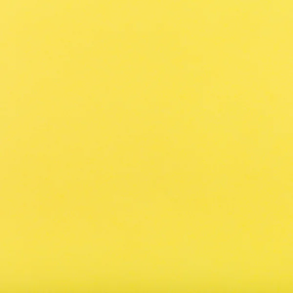 Žlutá barva tónovaný čtverečních list papíru — Stock fotografie