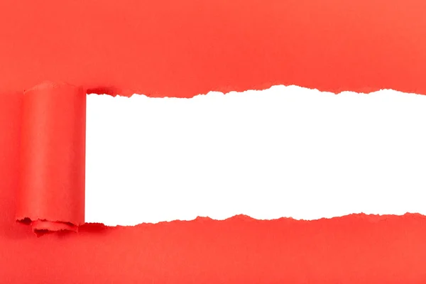 Red rolled-up torn paper on white isolated — Stock Photo, Image