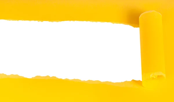 Debajo de la vista de papel desgarrado enrollado amarillo sobre blanco —  Fotos de Stock