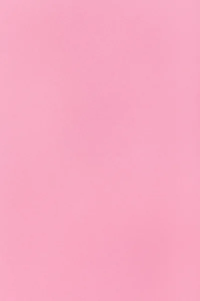 pink colored vertical sheet of paper