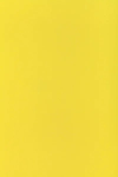 Gele kleur afgezwakt verticale vel papier — Stockfoto