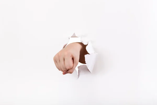 Direct view of the fist breaks a paper — Stock Photo, Image