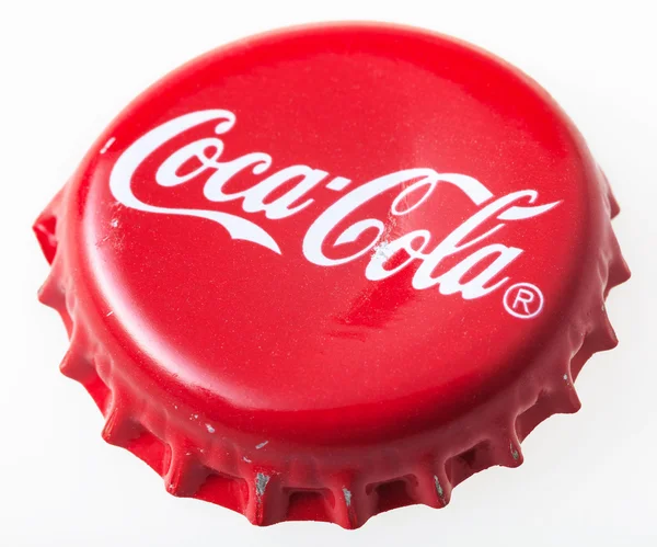 Tapa roja usada de la botella de vidrio de Coca-Cola — Foto de Stock