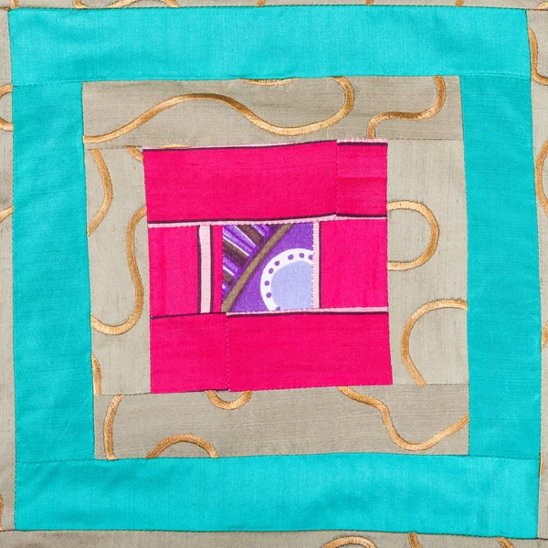 Square decor of patchwork cloth — Stock Photo, Image