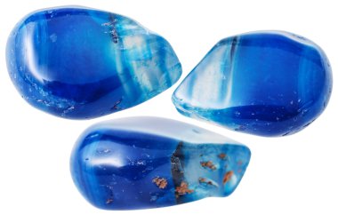 three Blue-toned agate gemstones isolated clipart