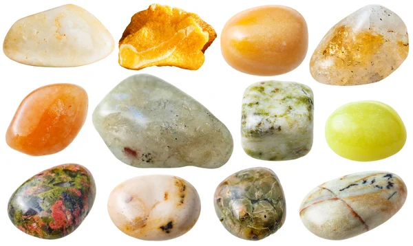 Set from 12 pcs yellow, brown and green gemstones — Stockfoto