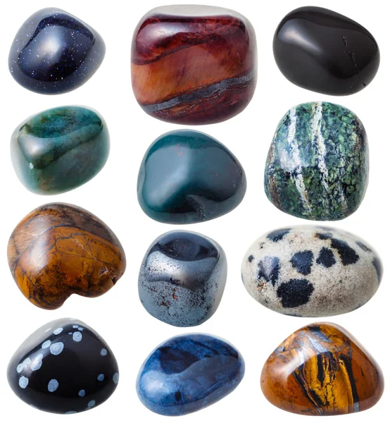 Conjunto de pedras preciosas azuis, verdes, marrons e pretas — Fotografia de Stock