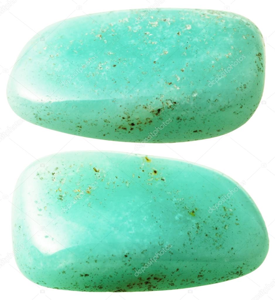 two aquamarine (beryl) gemstones isolated
