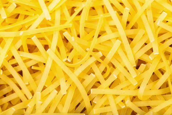Durum wheat semolina tagliolini noodles close up — стоковое фото
