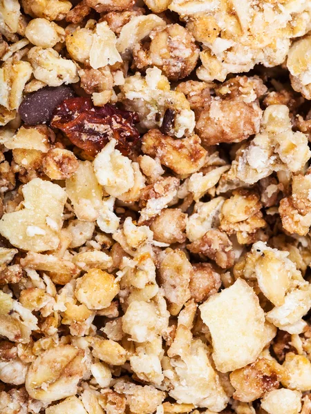 Muesli with dried fruit, nuts, chocolate close up — Stock Photo, Image
