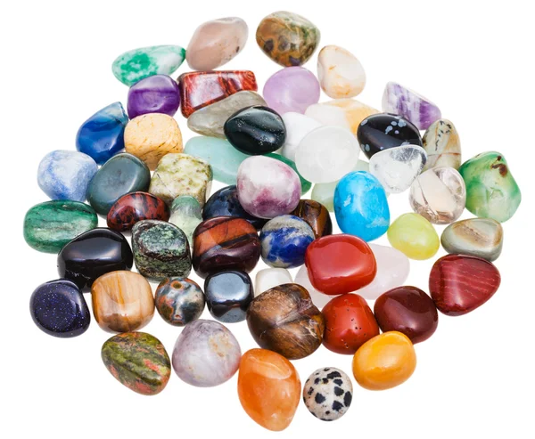 Acima vista de várias pedras preciosas no fundo branco — Fotografia de Stock