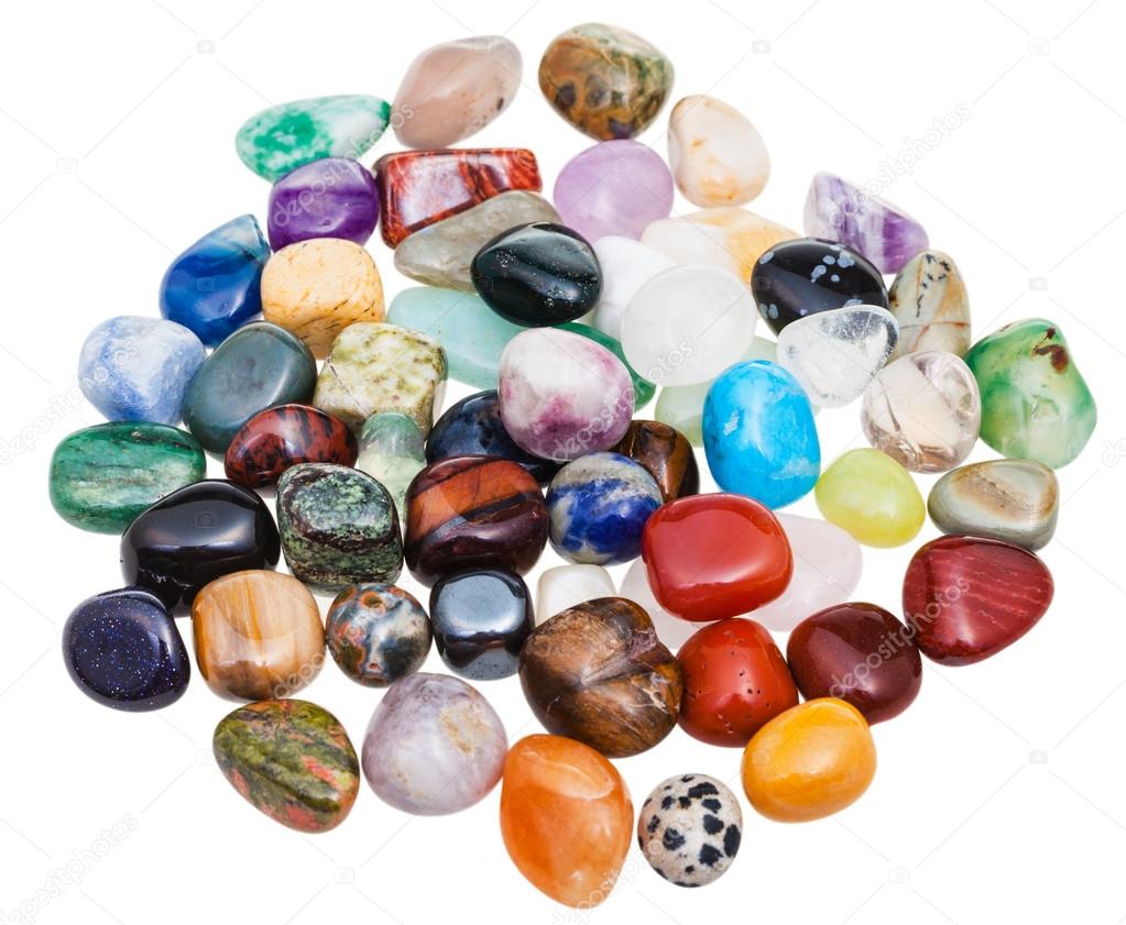 above view of various gems on white background