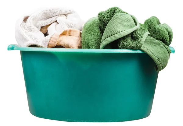 Widok z boku o okrągły zielony umywalka z ręcznikami — Zdjęcie stockowe