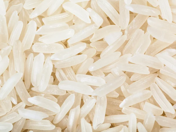 stock image long-grain uncooked white jasmine rice close up