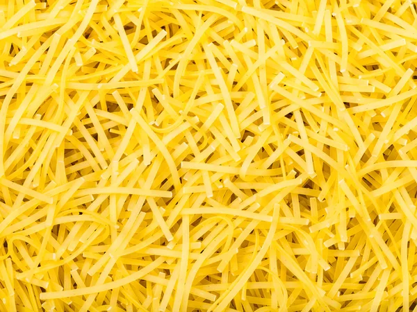 Många durum vete mannagryn tagliolini nudlar — Stockfoto