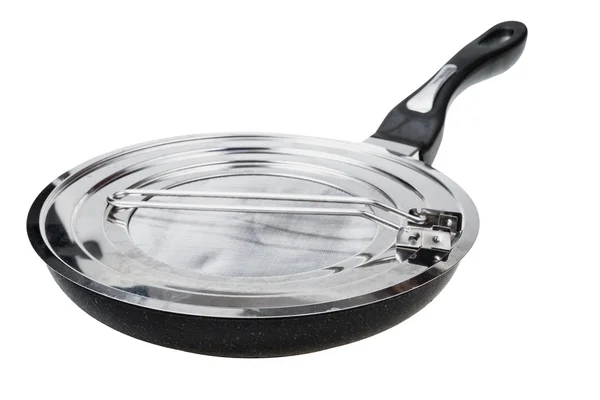 Steel frying pan closed by splatter screen — Stock Photo, Image