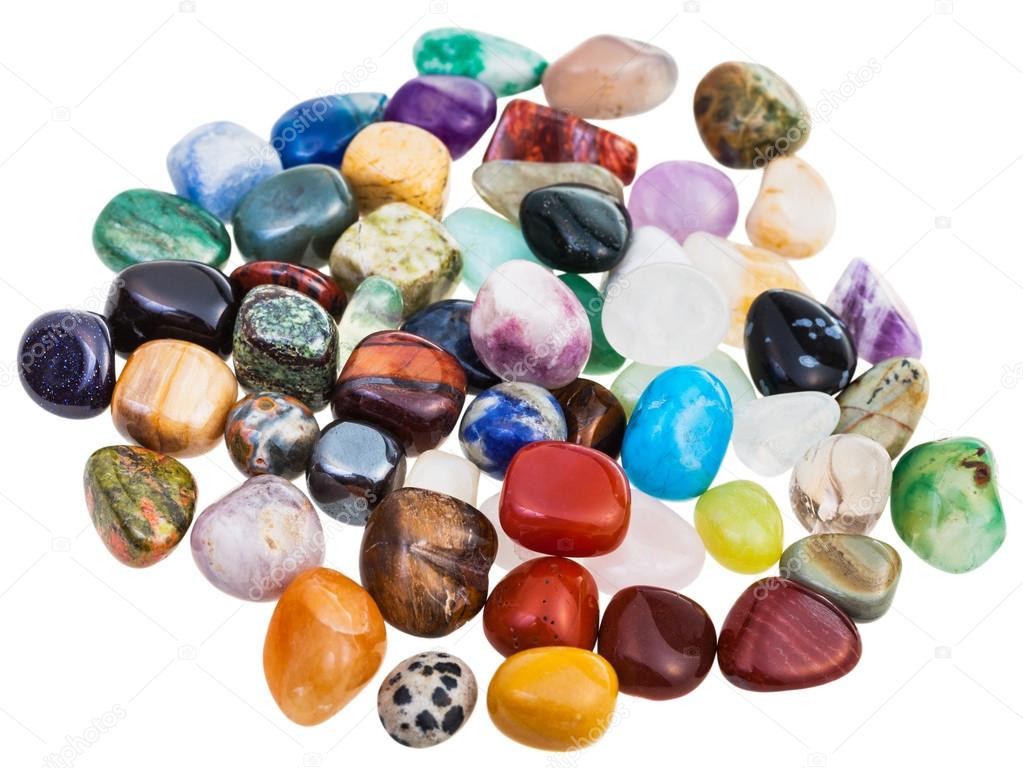 various gemstones on white background