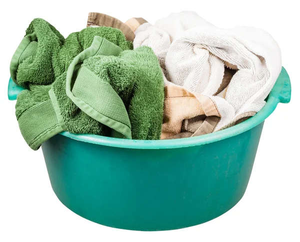 Green plastic wash basin with towels isolated — Stock Photo, Image