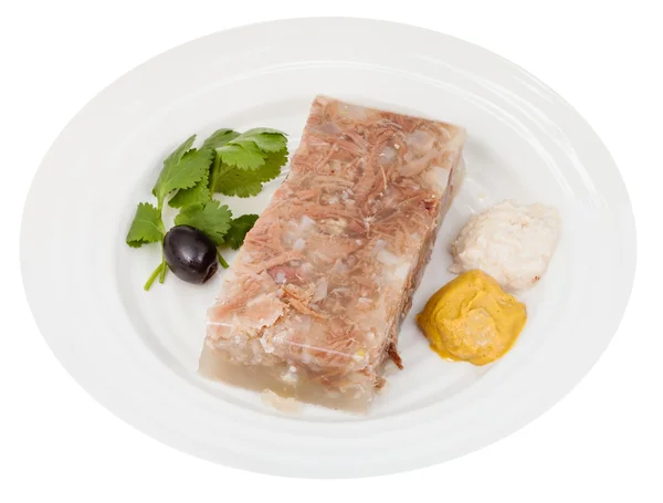 Portion of beef aspic with seasonings on plate — Stock Photo, Image