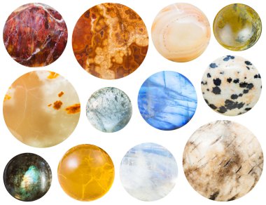 many round cabochon gem stones isolated on white