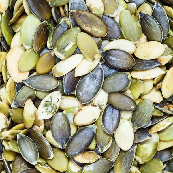 Green peeled pumpkin seeds — Stock Photo, Image