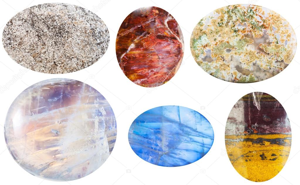various cabochon gem stones isolated on white