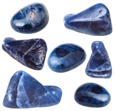 various dumortierite gem stones isolated on white